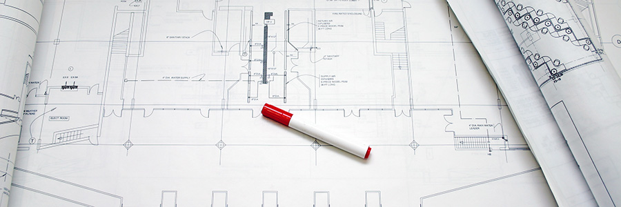 CAD drawings with a red marker
